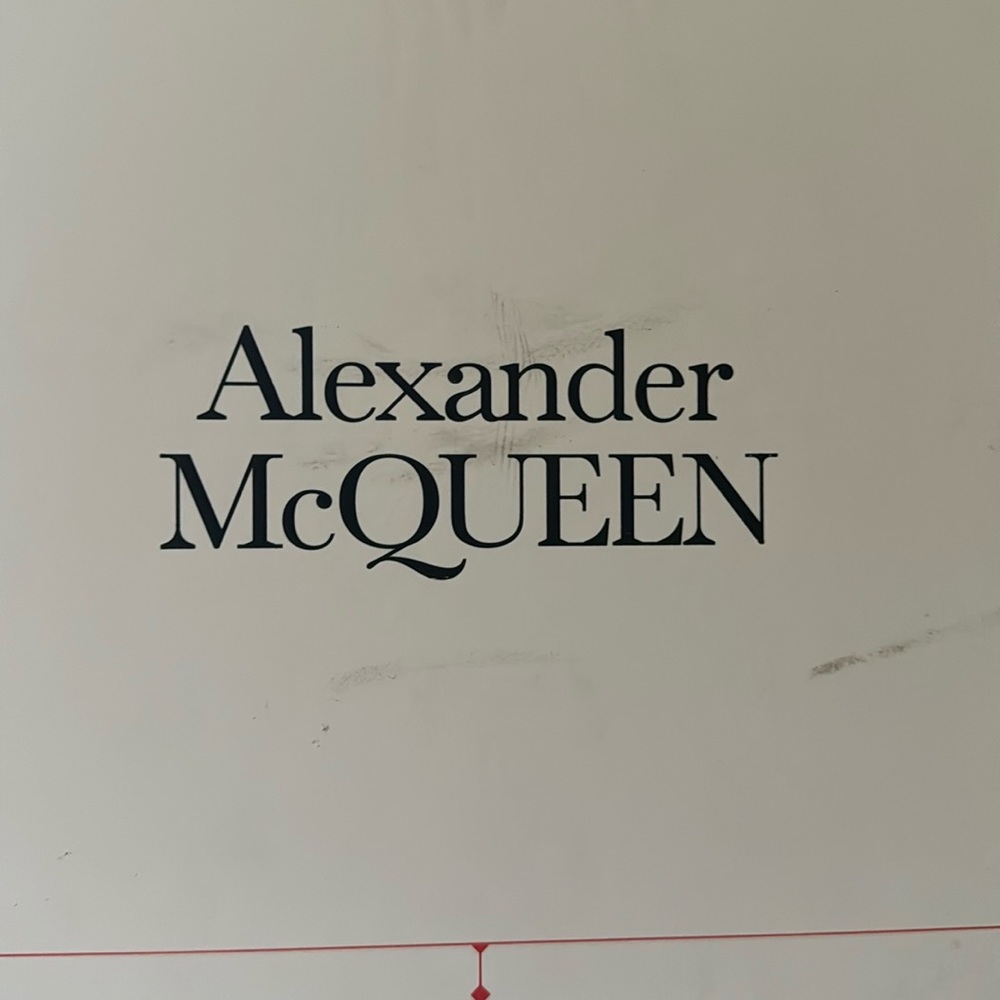 Selling a pair of Alexander McQueen sneake white leather rubber soles size 49E